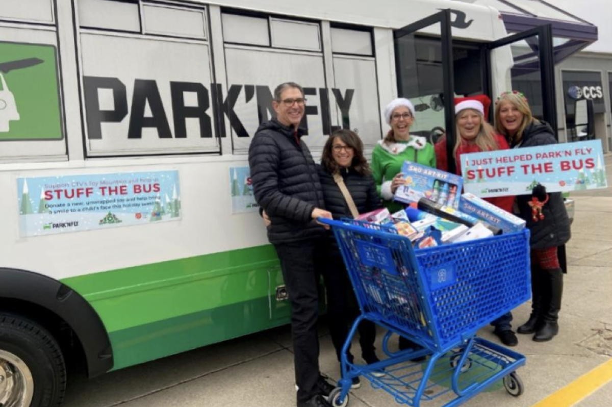 Paxtraveljobs Park N Fly Stuffs The Bus In Support Of Holiday Toy Drive